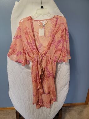 Bundle Of Three Cover Ups One New Two Like New.